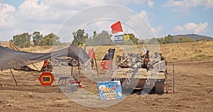 Merkava tanks and Israeli soldiers in training armored forces