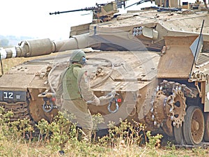 Merkava tanks and Israeli soldiers in training armored forces