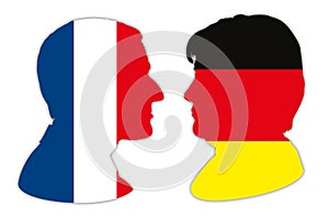 Merkel and Macron portrait silhouettes with France and Germany flags,
