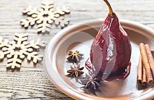 Merlot-poached pear on the plate