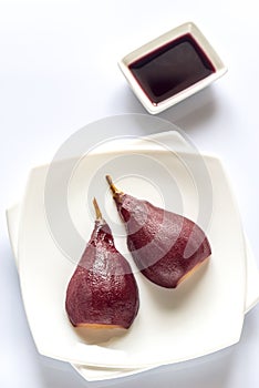 Merlot-poached pear on the plate