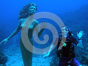 Mermaid and diver