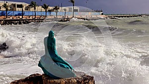 Mermaid sculpture on Silifke seashore, a blend of myth and art. Myth of mermaid captured in sculpture during Silifke