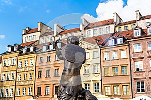 Mermaid `Syrena` statue in the historical center of Warsaw, Poland photo