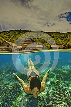 Mermaid in Tropical Seas, Raja Ampat, Indonesia