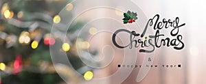 Merry Christmas ans Happy New Year text on colorful bokeh background