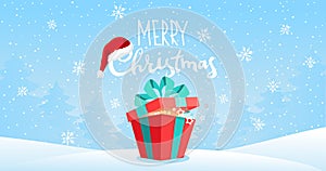 Merry christmas banner with copy space. Large gift box on a background of a winter landscape with snowflakes. Flat