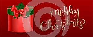 Merry Christmas banner design with a shiny red gift box. Vector Illustration.