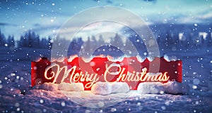 Merry Christmas banner in snow winter scenery.