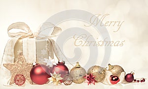 Merry Christmas Card with Gift and Ornaments