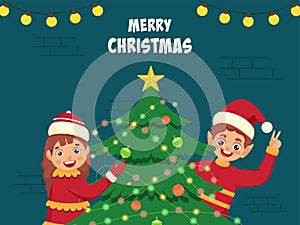 Merry Christmas Celebration Poster Design With Cheerful Girl And Elf Boy Presenting Decorative Xmas Tree On Teal Blue Brick Wall