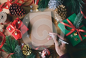 Merry christmas concepts with human hand writing greeting cards