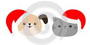 Merry Christmas. Cute dog cat round face icon in red Santa hat. Funny kawaii doodle baby animal. Cute cartoon funny character.