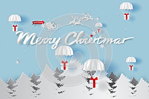 Merry Christmas day background.Parachute gift box fly air in holiday greeting card.Happy new year postcard.Paper cut and craft