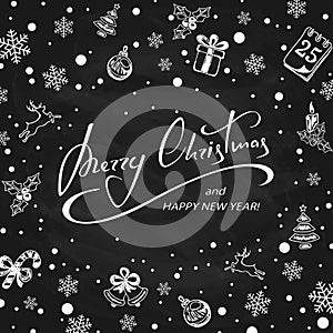 Merry Christmas with decorations on black chalkboard background