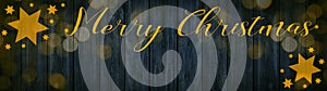 Merry Christmas festive celebration background banner panorama greeting card - Golden stars, hand lettering and bokeh lights, on