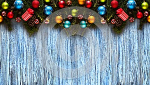 Merry Christmas Frame with real wood green pine and colorful baubles,
