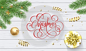 Merry Christmas golden decoration and calligraphy font on white wooden background for greeting card. Vector Christmas or New Year