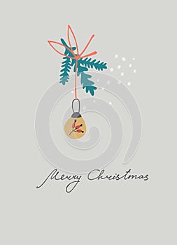 Merry Christmas greeting card with fir tree branch, bauble ornament, snowflakes, hand lettering on beige background