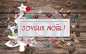 Merry christmas greeting card with french text - decoration multicolored with miniatures.