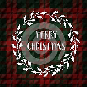 Merry Christmas greeting card, invitation. White Christmas wreath made of holly. Hand lettered text. Tartan checkered plaid.