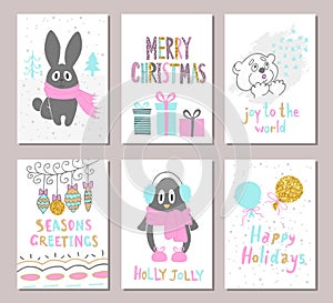Merry Christmas greeting card set with cute xmas tree, rabbit, penguin, bear, balloons, gifts and other elements. Cute Hand drawn
