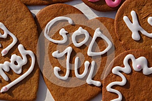 Merry Christmas greetings in Swedish on gingerbread-cookies