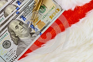 Merry Christmas and happy holidays gift with dollars banknotes