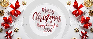 Merry Christmas and Happy Holidays greeting card, frame, banner. New Year. Noel. Christmas gifts and red, golden decor on white