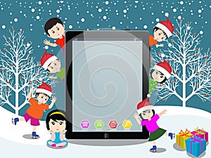 Merry christmas with happy kids and tablet