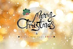 Merry Christmas and Happy New Year 2017 text on shiny gold bokeh background