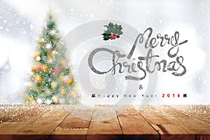 Merry Christmas and Happy New Year 2018 texts above wood table t