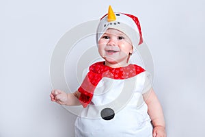 Merry christmas and happy new year. happy baby in snowman costume