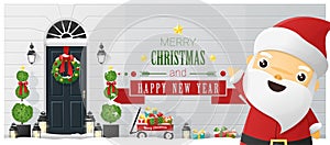 Merry Christmas and Happy New Year background with decorated Christmas front door and Santa Claus