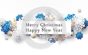 Merry Christmas and Happy New Year banner. Abstract white, gold and blue snowflakes with space for your text. Paper art and craft