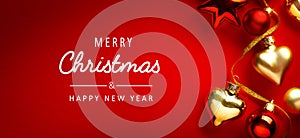 A Merry Christmas and happy New Year banner; Christmas Tree Decorations on Red Background