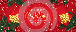 Merry Christmas and Happy new year banner decorated with gifts box, green pine branches, snowflake, holly berry and red ball.