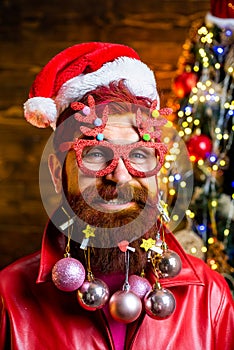 Merry Christmas and Happy new year. Christmas Celebration holiday. Winter emotion. Portrait of handsome Santa man