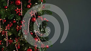 Merry Christmas and Happy New Year concept banner.Red balls,striped lollipops,Christmas tree branches,stars,branches with berries,