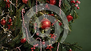 Merry Christmas and Happy New Year concept banner.Red balls,striped lollipops,Christmas tree branches,stars,branches with berries,