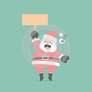 merry christmas and happy new year with cute santa claus holding blank sign in the winter season green background