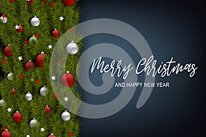 Merry Christmas and Happy New Year design concept. Fir tree branch decoration with glass balls and small stars on blue background.