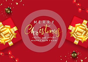 Merry Christmas and Happy New Year. Gift box decor gold ribbon-bow and decoration with light, Christmas ball, confetti on a red.