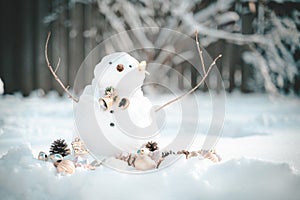 Merry Christmas and happy New Year greeting card with copy-space.Many snowmen standing in winter Christmas landscape.