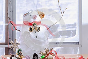 Merry Christmas and happy New Year greeting card with copy-space.Many snowmen standing in winter Christmas landscape.
