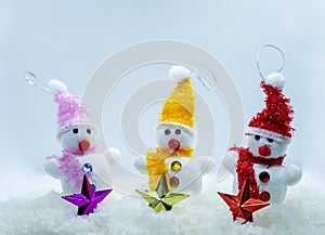 Merry Christmas and happy New Year greeting card with copy-space.Many snowmen standing in winter Christmas landscape