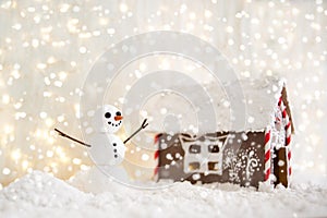 Merry christmas and happy new year greeting card with copy-space.Happy snowman standing in winter christmas landscape.Snow backgro