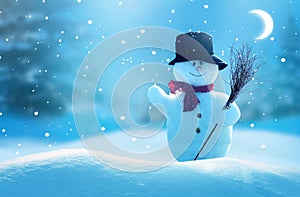 Merry christmas and happy new year greeting card .Two cheerful snowman standing in winter christmas landscape