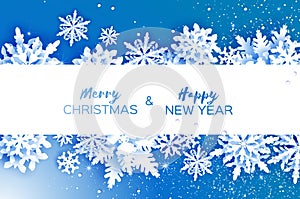 Merry Christmas and Happy New Year Greetings card. White Paper cut snowflakes. Origami Winter Decoration background