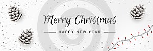Merry Christmas and Happy New Year Invitation. Christmas Background with Pinecones, String Lights, Caligraphy Text. Creative photo
